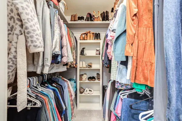 a view of a house with a small yard