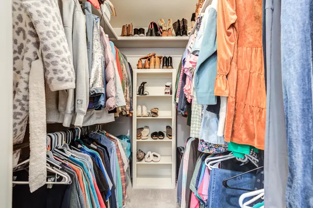 a view of a house with a small yard