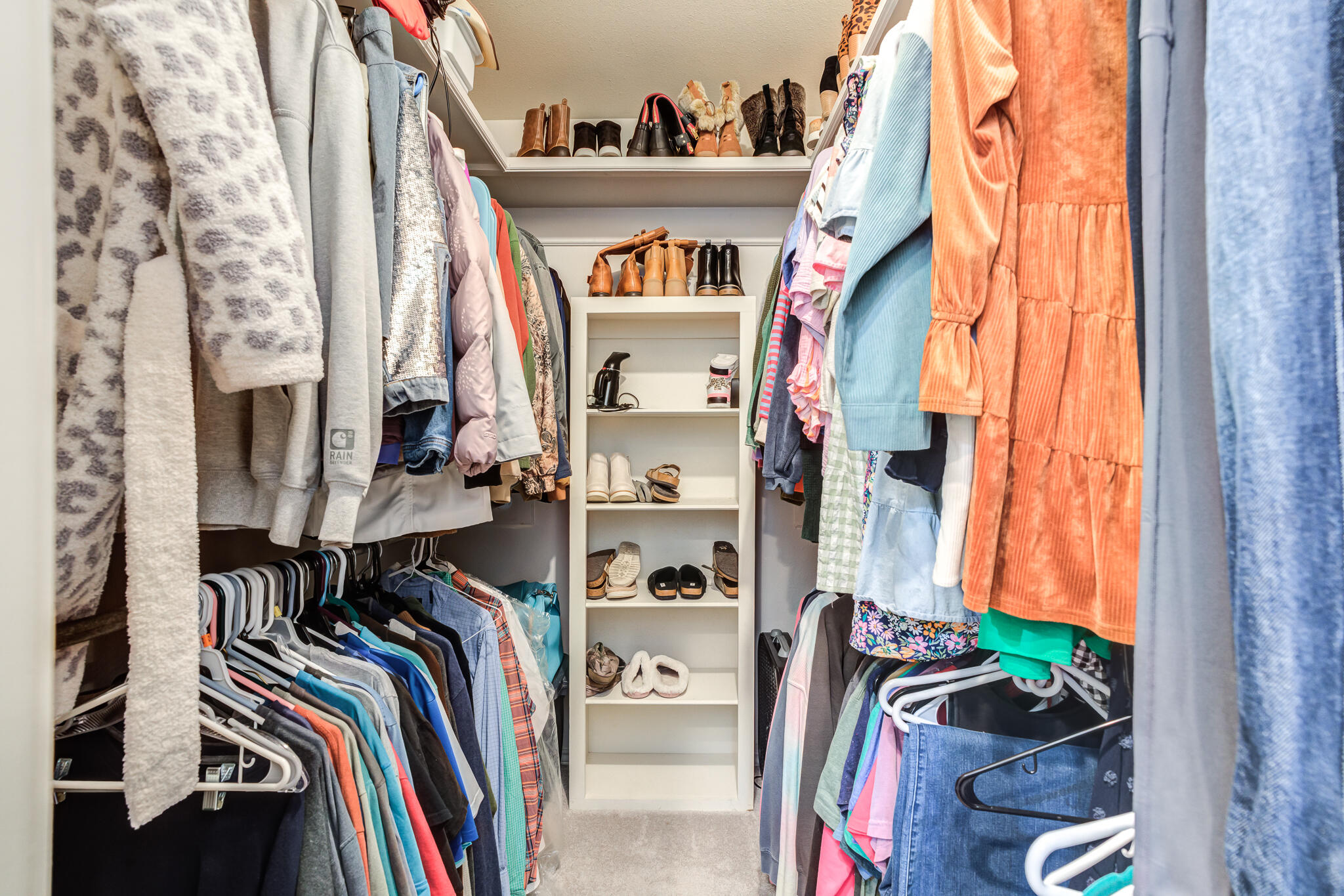 5 West Brookhollow Ransom Canyon, TX 79366 - Photo 46 of 62 a view of walk in closet with clothes and shoes
