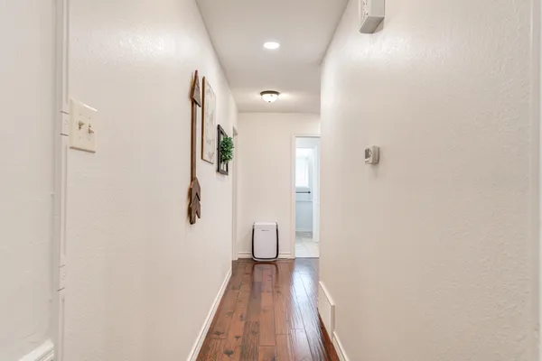 a view of a backyard with a slide and a child swing