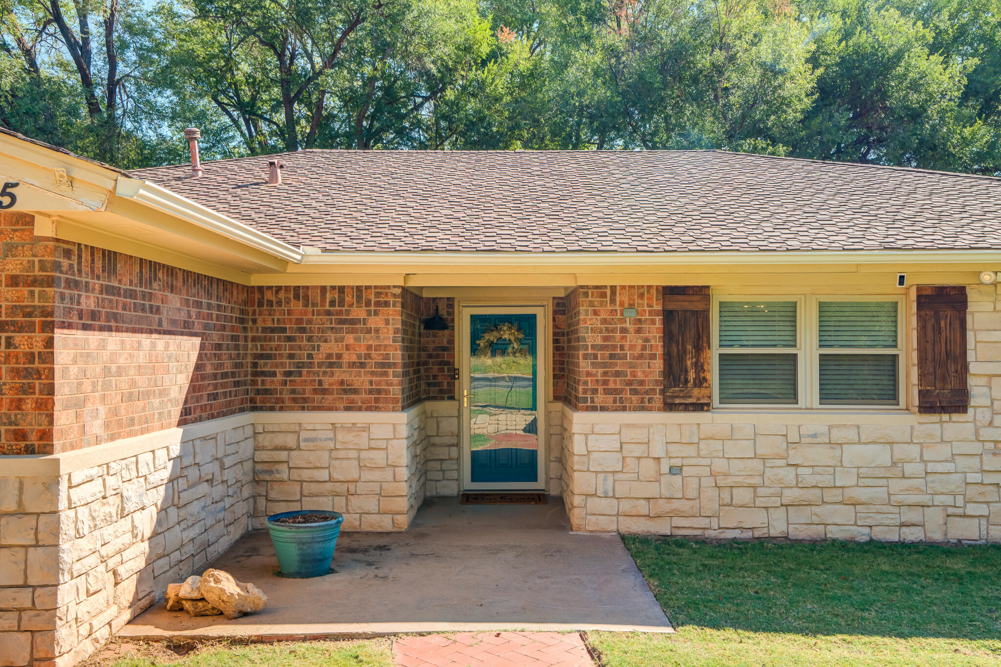 5 West Brookhollow Ransom Canyon, TX 79366 - Photo 55 of 62 a view of a house with a small yard
