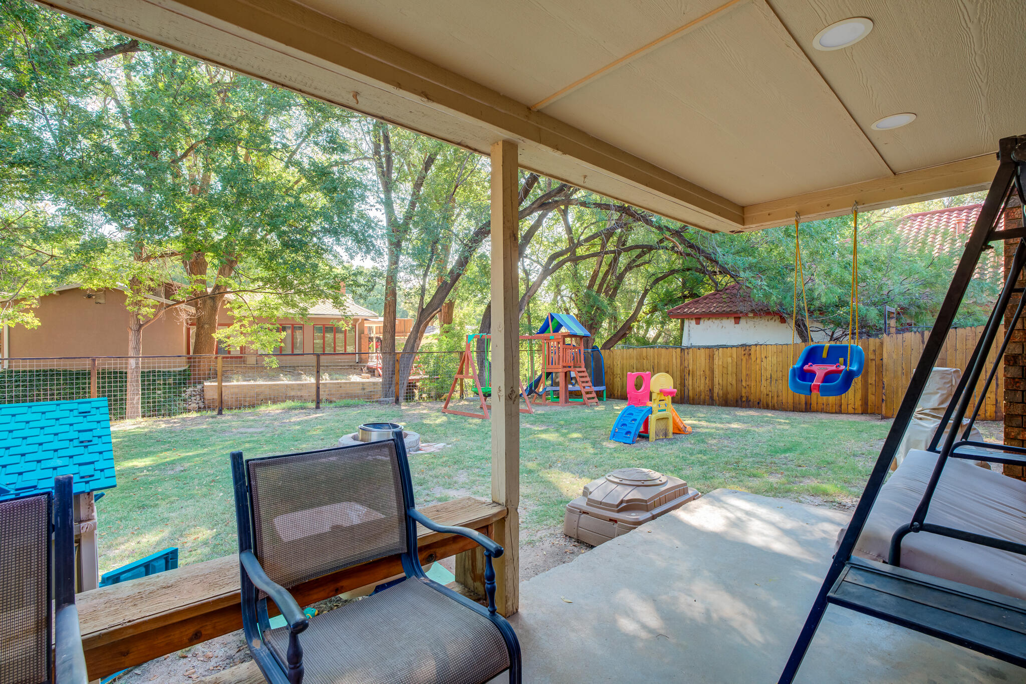 5 West Brookhollow Ransom Canyon, TX 79366 - Photo 9 of 62 a view of backyard with trampoline