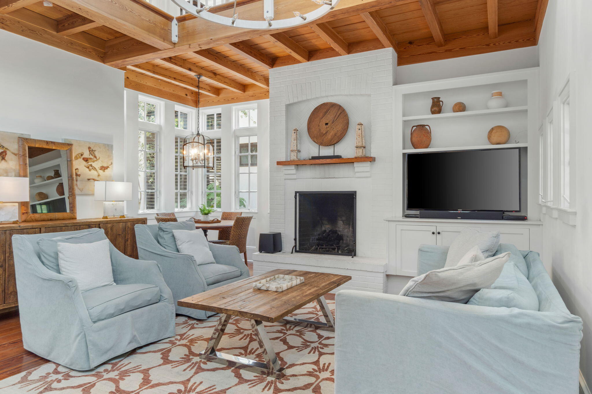 16 South Green Turtle Lane Inlet Beach, FL 32461 - Photo 13 of 59 a living room with furniture a flat screen tv and a fireplace