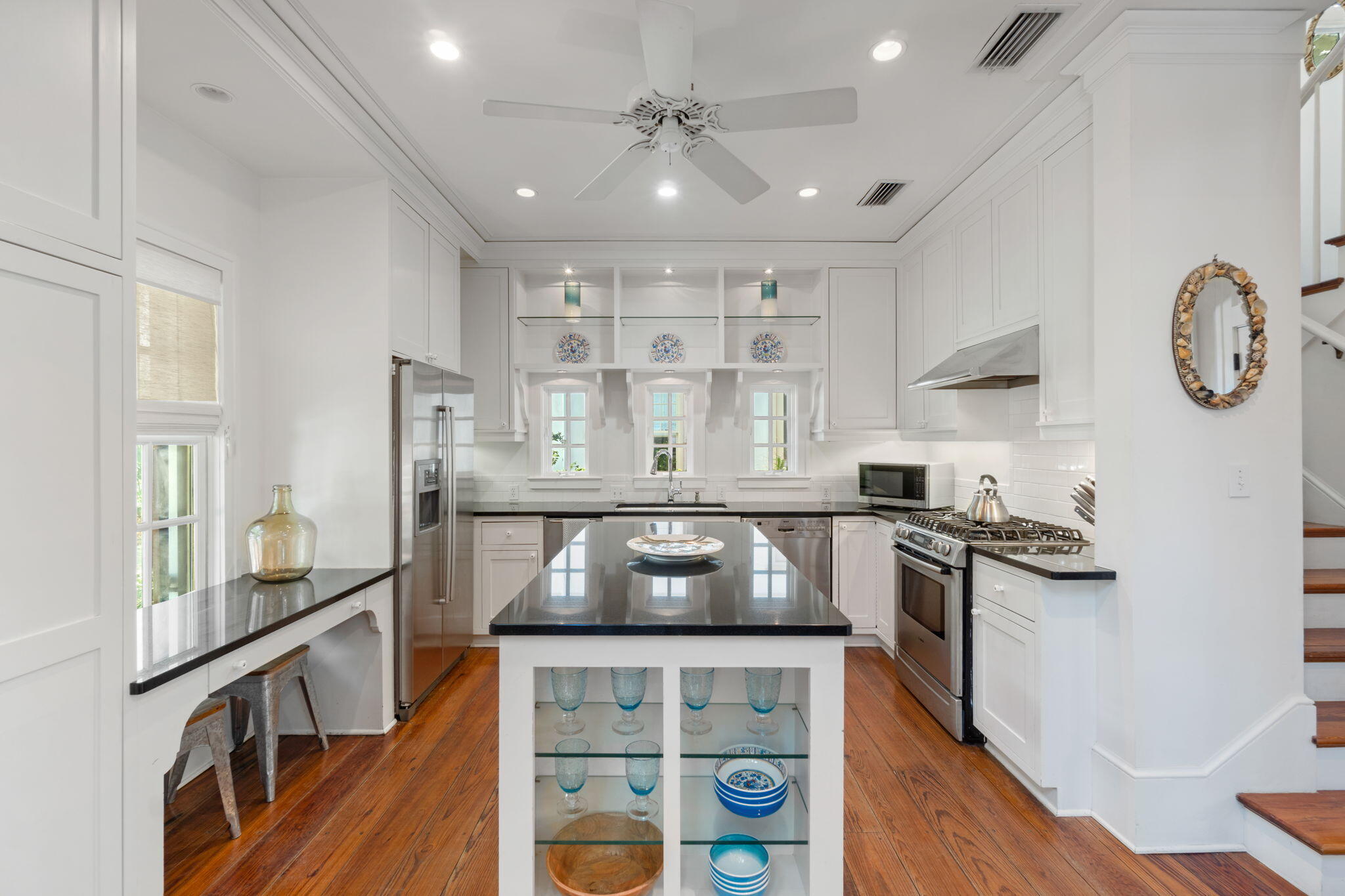 16 South Green Turtle Lane Inlet Beach, FL 32461 - Photo 19 of 59 a kitchen with stainless steel appliances granite countertop a stove and a refrigerator
