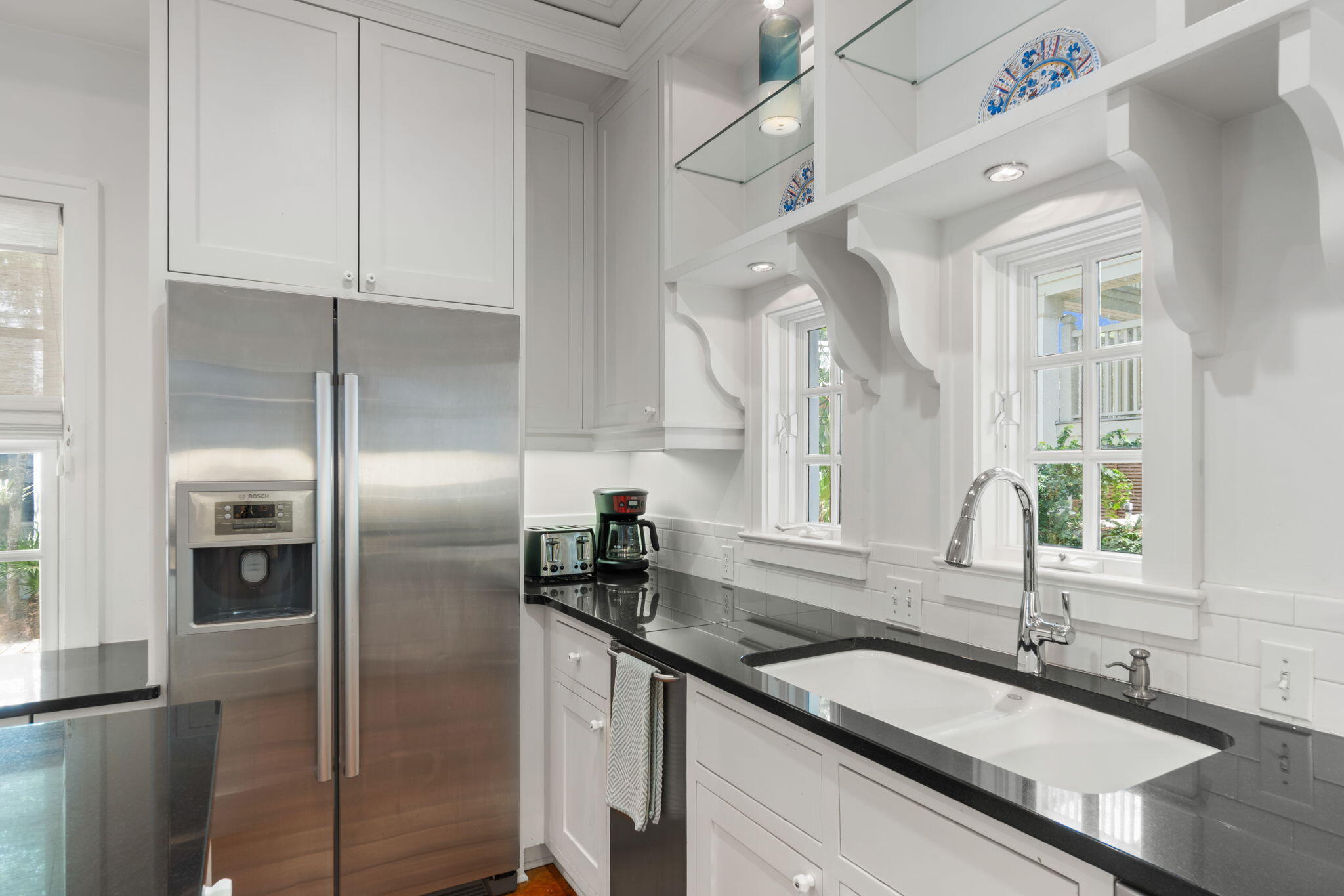 16 South Green Turtle Lane Inlet Beach, FL 32461 - Photo 21 of 59 a kitchen with granite countertop a sink and a refrigerator
