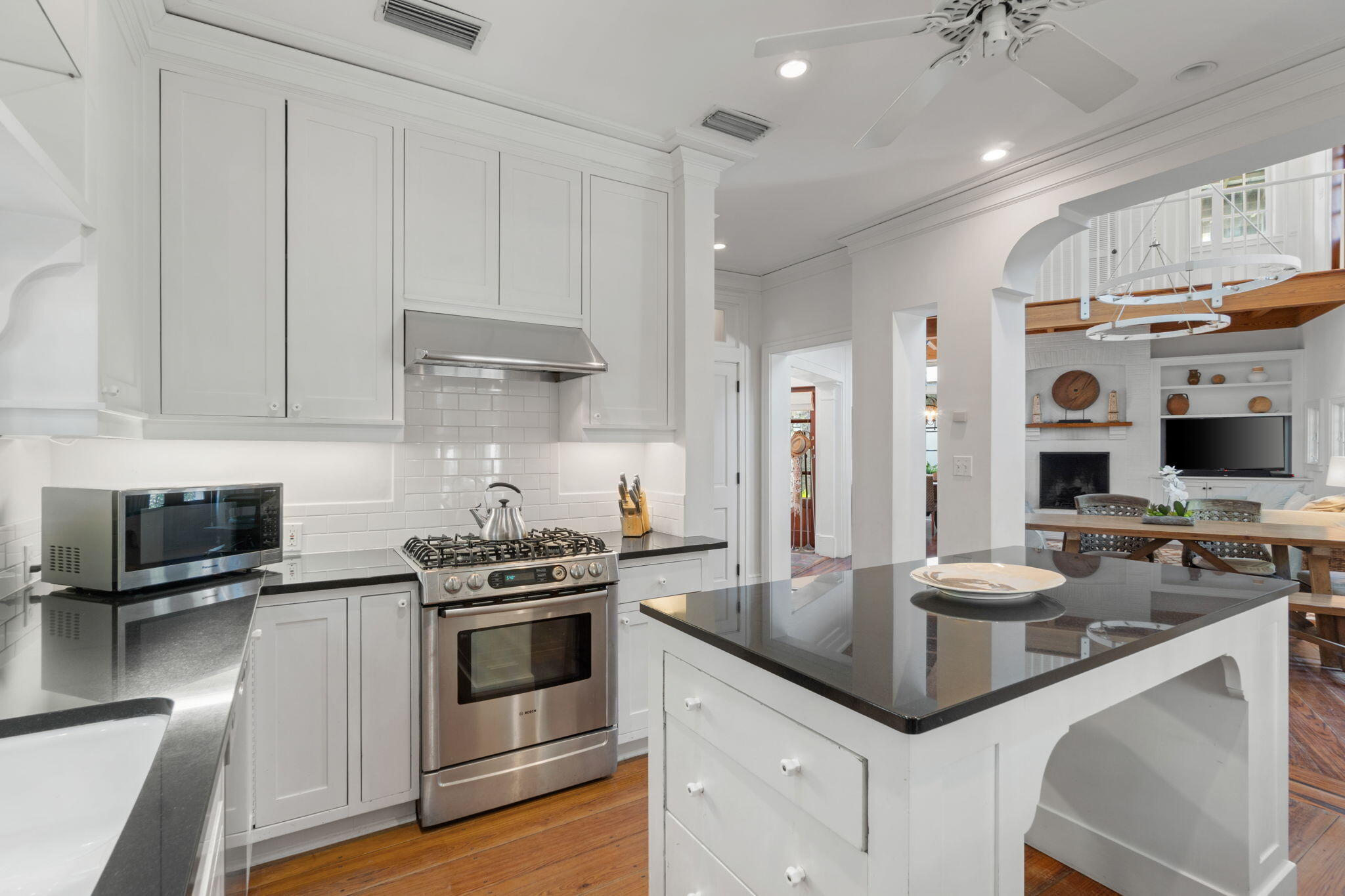 16 South Green Turtle Lane Inlet Beach, FL 32461 - Photo 22 of 59 a kitchen with stainless steel appliances granite countertop a stove and a sink
