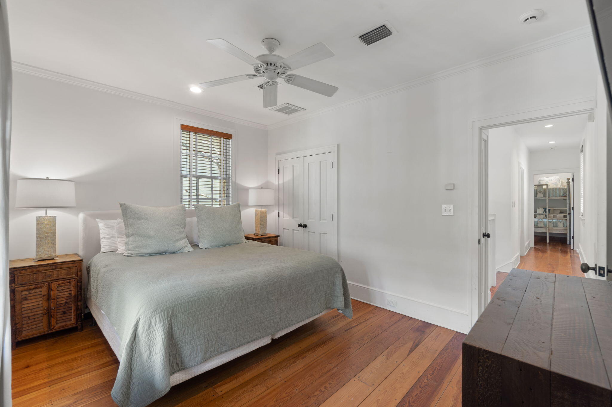 16 South Green Turtle Lane Inlet Beach, FL 32461 - Photo 35 of 59 a bedroom with a bed and wooden floor