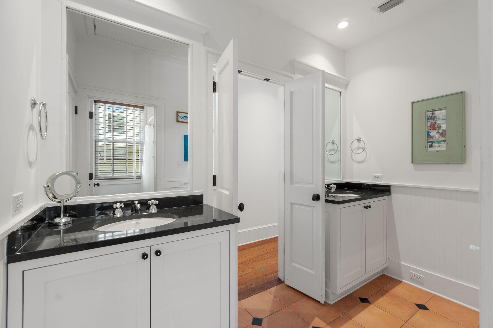 16 South Green Turtle Lane Inlet Beach, FL 32461 - Photo 36 of 59 a bathroom with a sink and a mirror