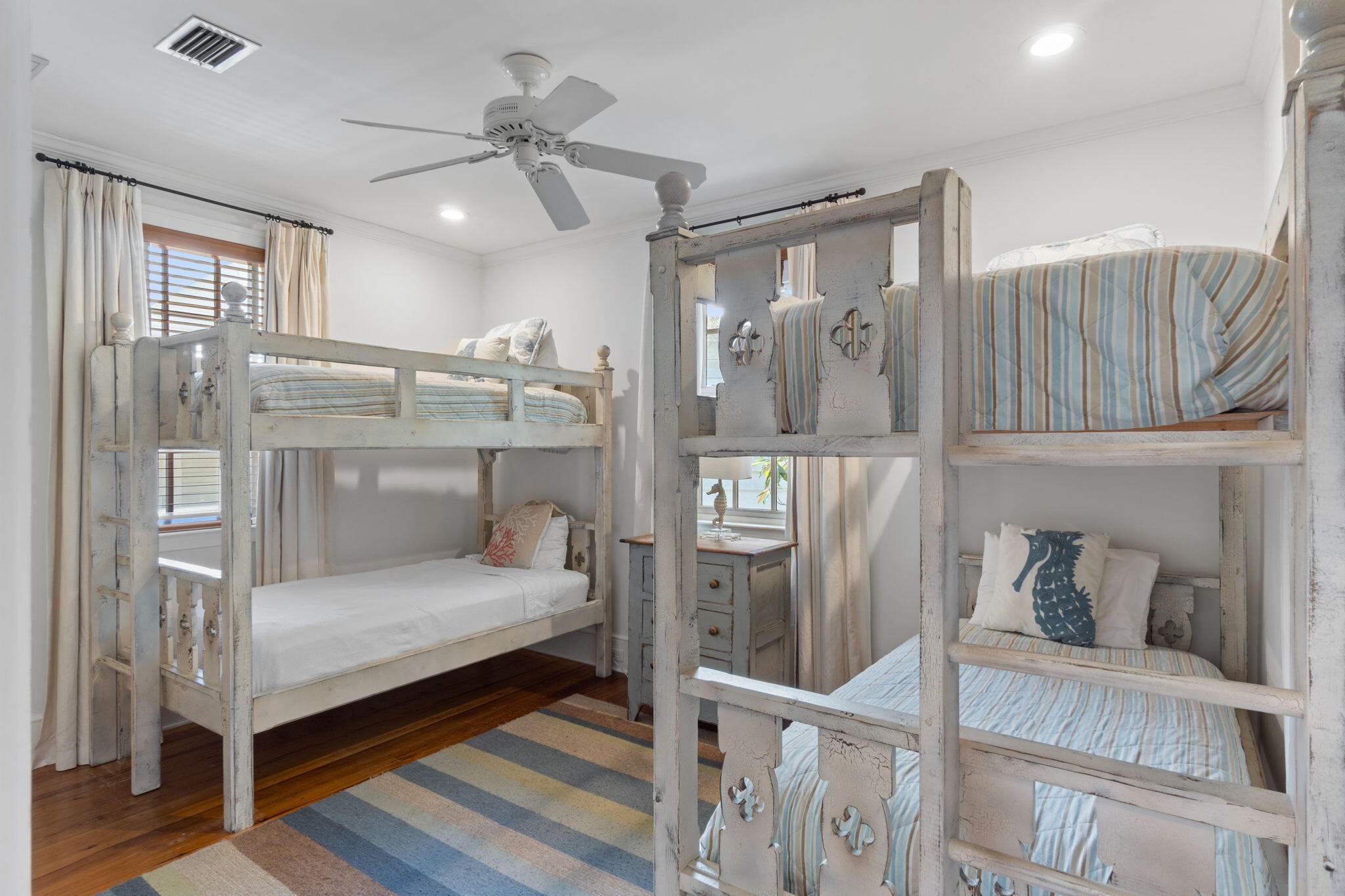 16 South Green Turtle Lane Inlet Beach, FL 32461 - Photo 39 of 59 a bedroom with a bed window and a wooden floor