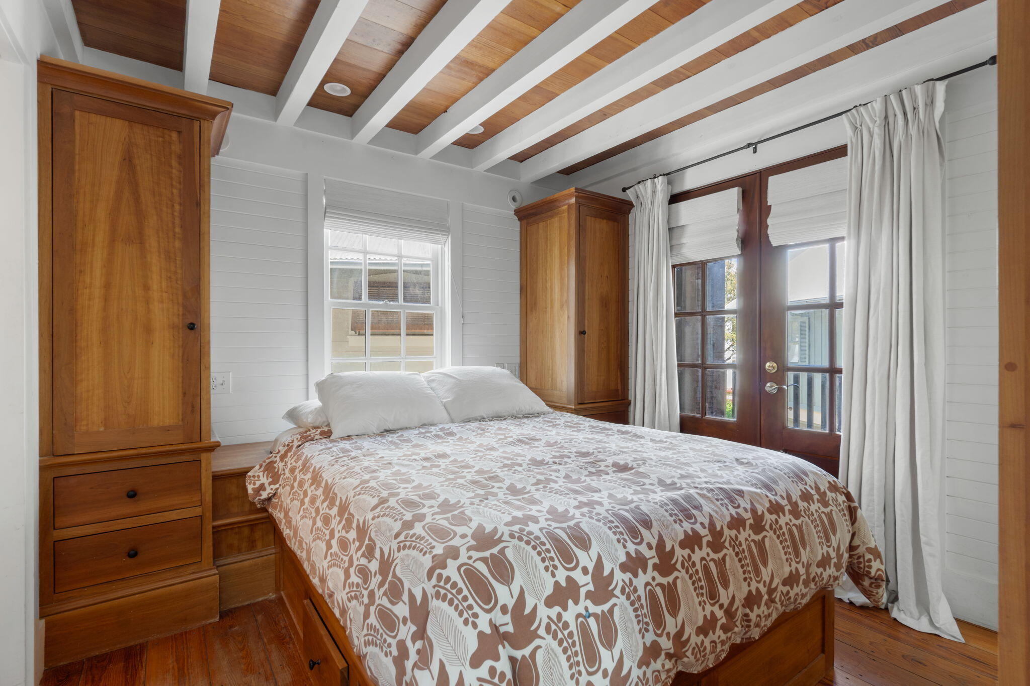 16 South Green Turtle Lane Inlet Beach, FL 32461 - Photo 48 of 59 a bedroom with a bed and wooden floor