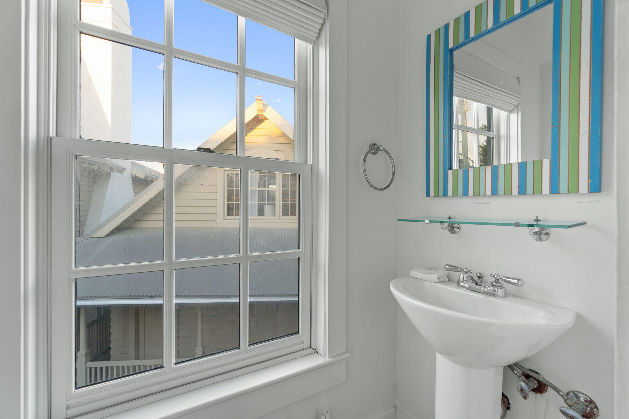 16 South Green Turtle Lane Inlet Beach, FL 32461 - Photo 53 of 59 a bathroom with a sink and a mirror