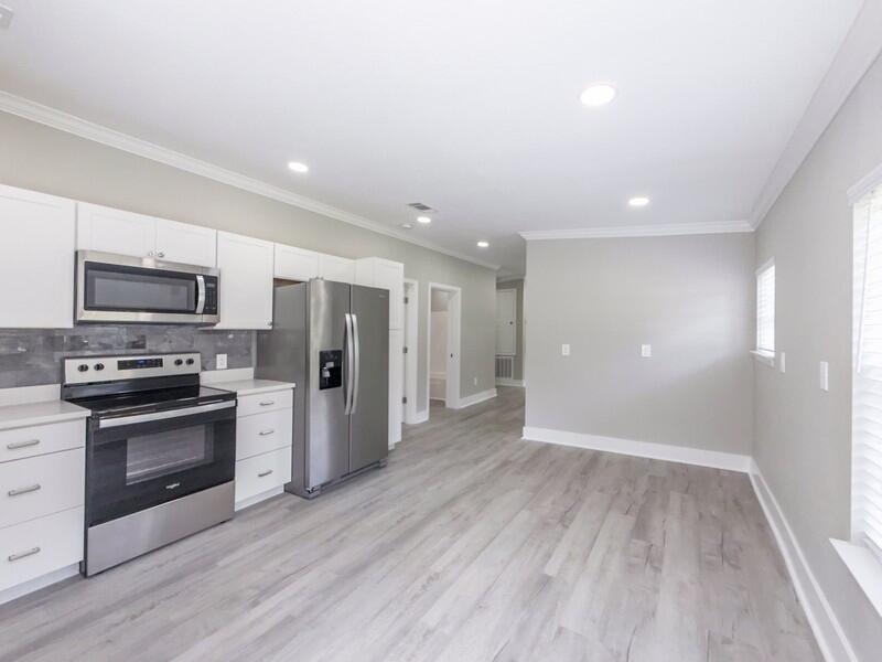 630 West Griffith Avenue Crestview, FL 32536 - Photo 14 of 36 a view of a kitchen with a sink stove and refrigerator