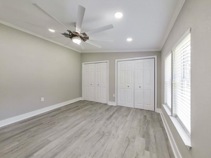 630 West Griffith Avenue Crestview, FL 32536 - Photo 20 of 36 wooden floor in an empty room with a window