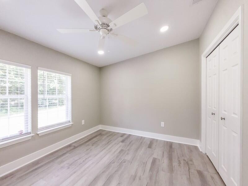 630 West Griffith Avenue Crestview, FL 32536 - Photo 23 of 36 wooden floor in an empty room with a window