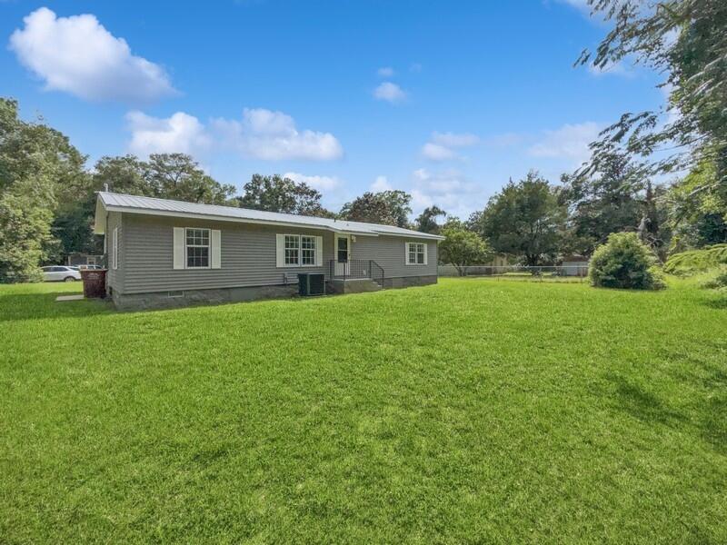 630 West Griffith Avenue Crestview, FL 32536 - Photo 35 of 36 a view of house with a backyard