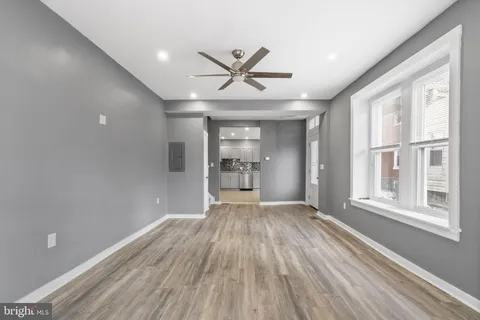 a view of an empty room and window