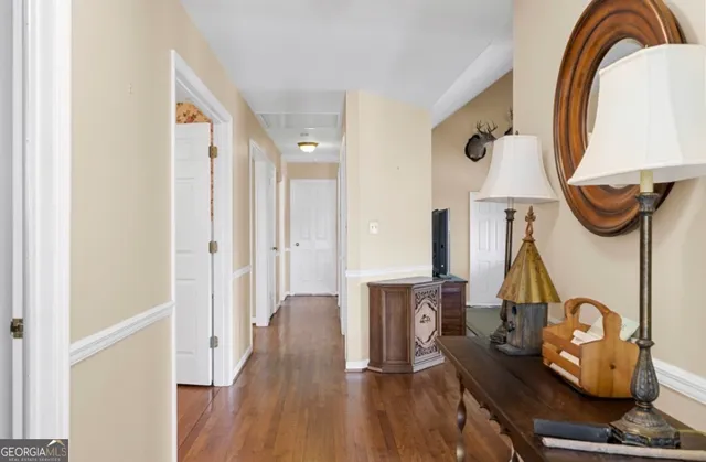 a view of a livingroom with furniture and wooden floor