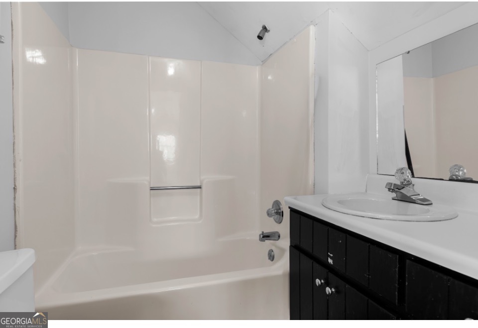 1776 Wax Road Southeast Silver Creek, GA 30173 - Photo 25 of 45 a bathroom with a sink and a bathtub