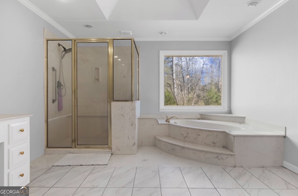 1776 Wax Road Southeast Silver Creek, GA 30173 - Photo 31 of 45 a bathroom with a bathtub and shower
