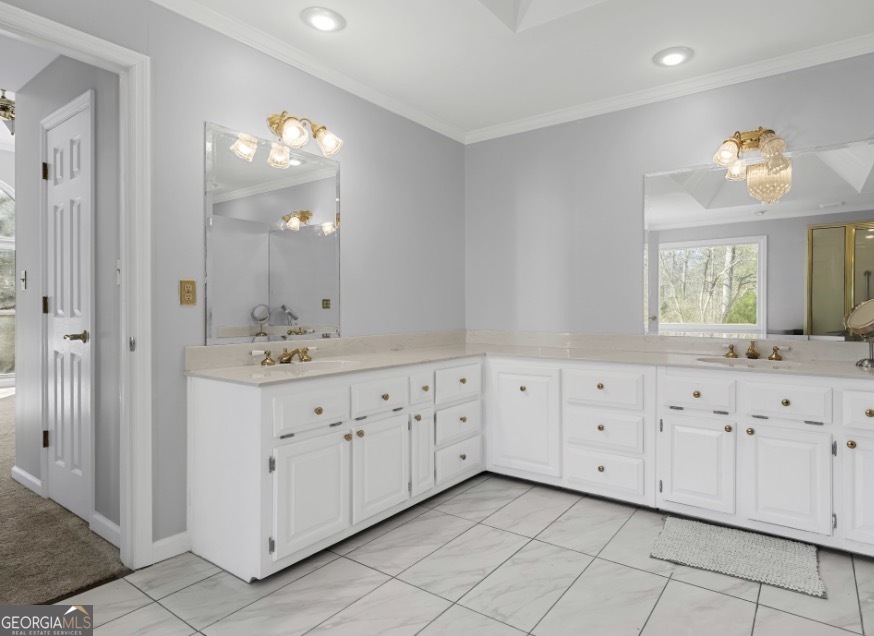 1776 Wax Road Southeast Silver Creek, GA 30173 - Photo 32 of 45 a spacious bathroom with double sink large mirror and a window