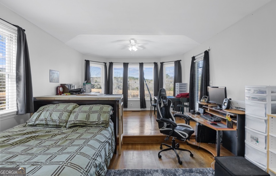 1776 Wax Road Southeast Silver Creek, GA 30173 - Photo 44 of 45 a bedroom with furniture and a large window