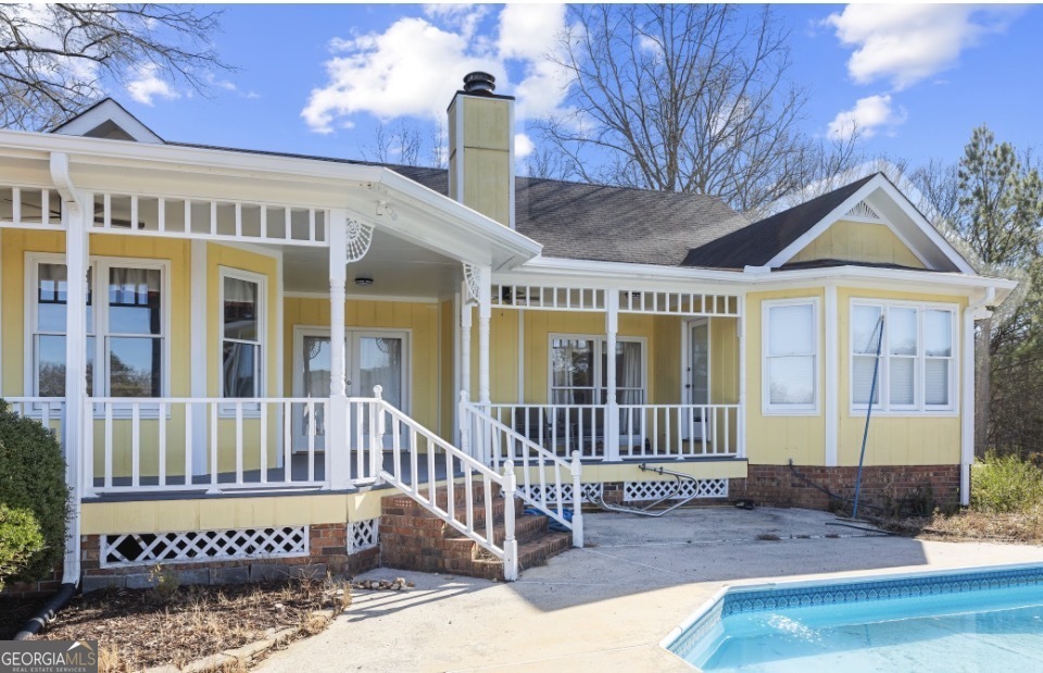 1776 Wax Road Southeast Silver Creek, GA 30173 - Photo 5 of 45 a view of a house with a deck