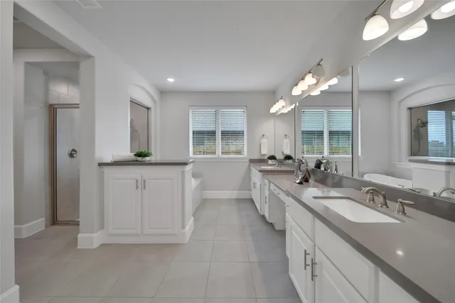 a dining room with furniture a chandelier and wooden floor