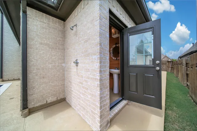 a backyard of a house with lots of green space