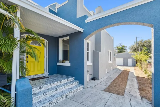 a view of an entryway door front of a house