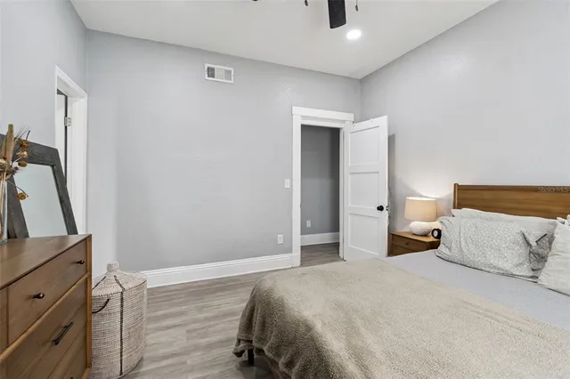 a bathroom with a toilet and a shower curtain