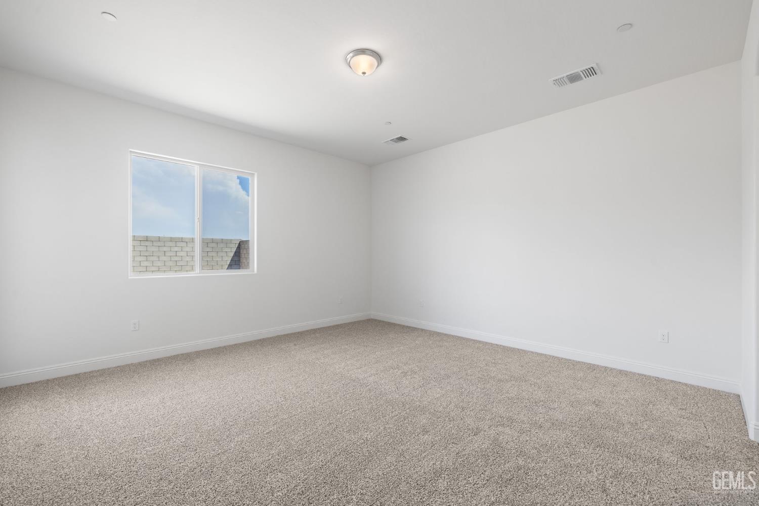 Undisclosed Address Bakersfield, CA 93314 - Photo 31 of 55 an empty room with a window