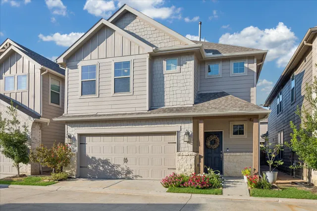 front view of a house and a yard