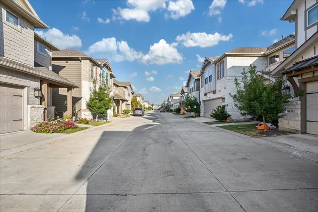a view of a building with a street