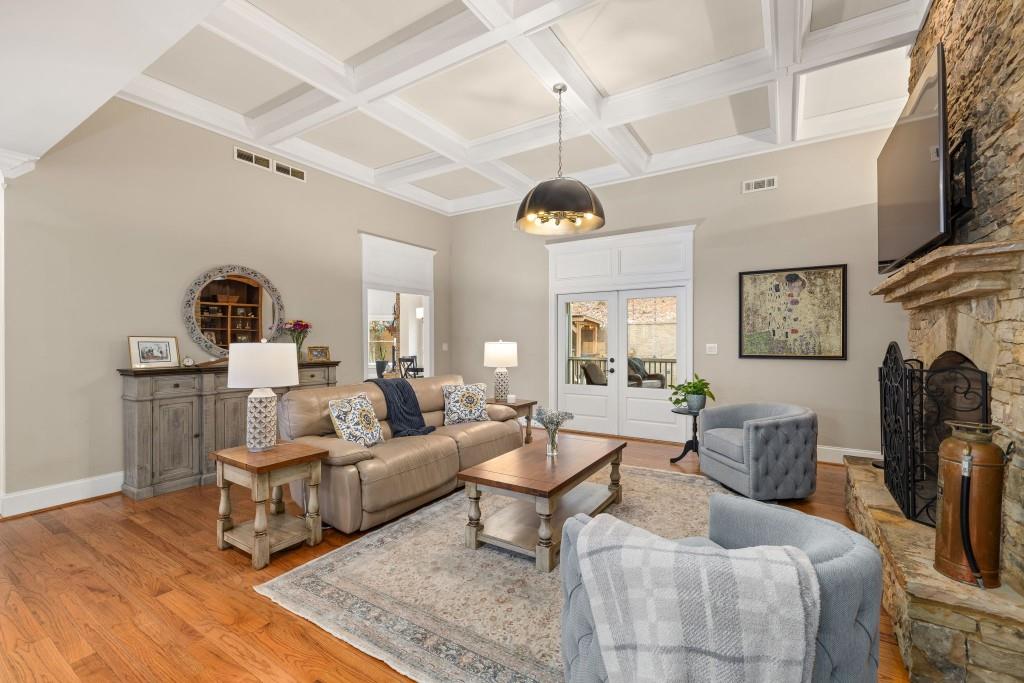 99 Madeline Anthony Road Dahlonega, GA 30533 - Photo 13 of 60 a living room with furniture and a fireplace