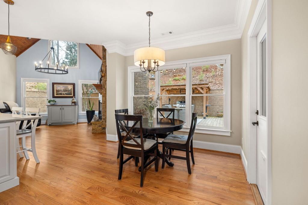 99 Madeline Anthony Road Dahlonega, GA 30533 - Photo 18 of 60 a view of a dining room with furniture window and wooden floor
