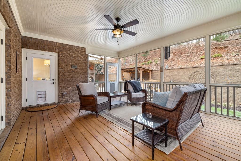 99 Madeline Anthony Road Dahlonega, GA 30533 - Photo 20 of 60 a living room with furniture and a wooden floor