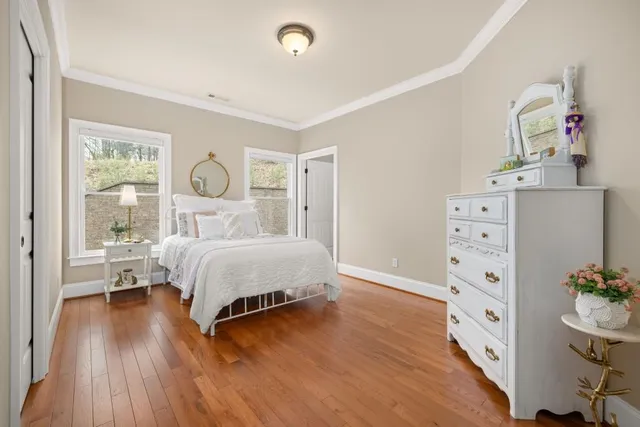 a bed room with a bed and a window