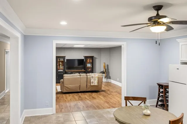 a view of a park with iron fence