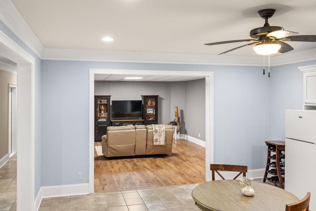 99 Madeline Anthony Road Dahlonega, GA 30533 - Photo 50 of 60 a living room with furniture and a flat screen tv