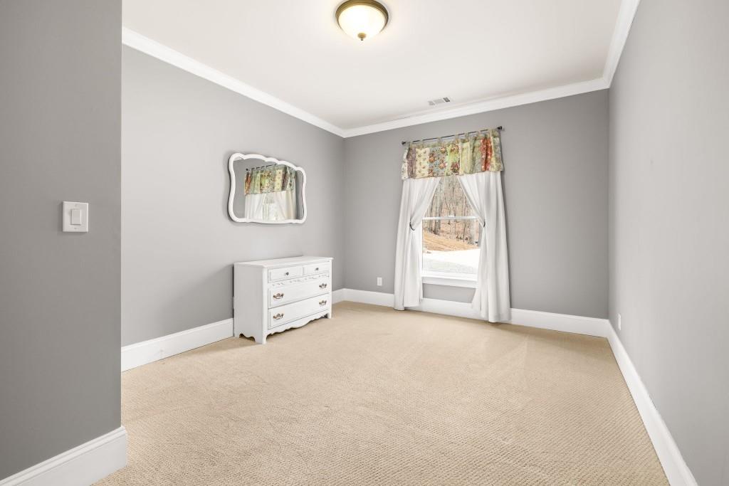 99 Madeline Anthony Road Dahlonega, GA 30533 - Photo 51 of 60 an empty room with windows and closet