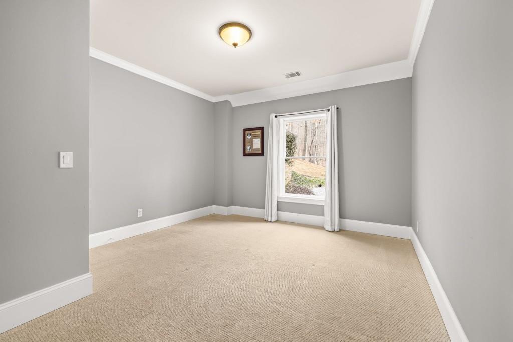 99 Madeline Anthony Road Dahlonega, GA 30533 - Photo 53 of 60 an empty room with windows and closet