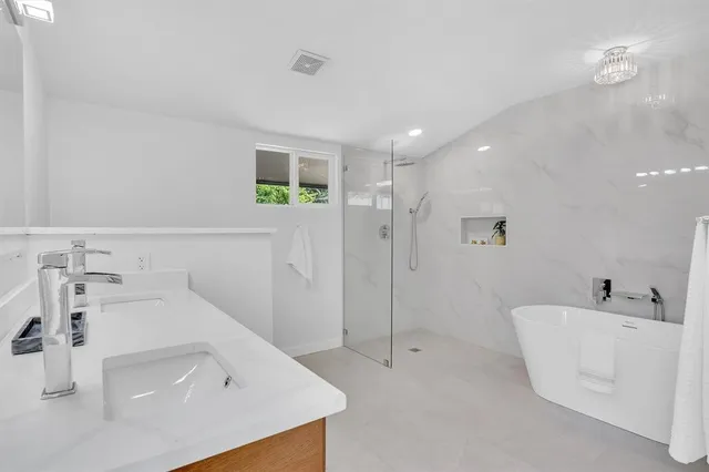 a bathroom with a sink and a bathtub