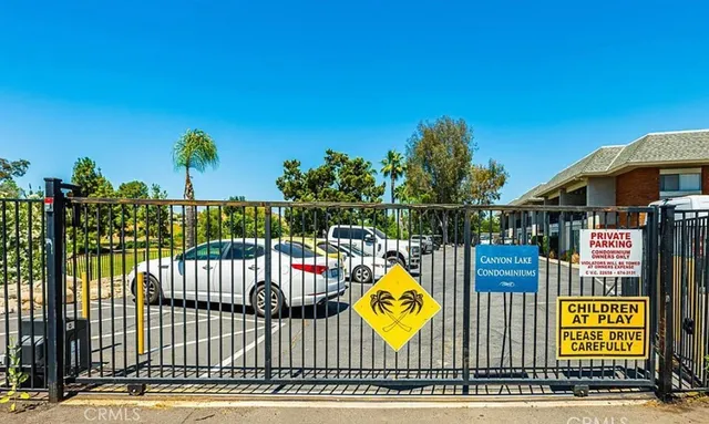 a view of a backyard with plants and a patio
