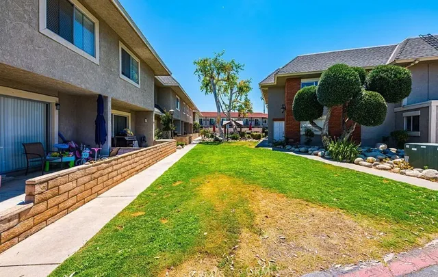 a view of a street with a car park front of a house