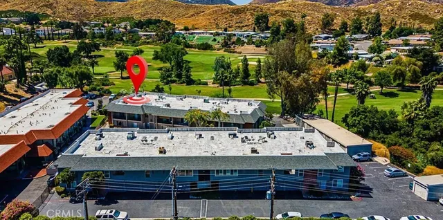 a view of a swimming pool with a lake view
