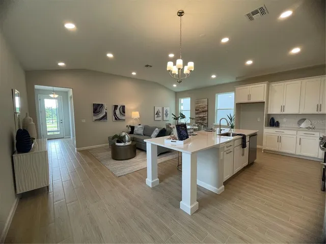 a kitchen with stainless steel appliances lots of counter top space