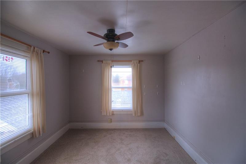 2248 Mercer Road New Brighton, PA 15066 - Photo 12 of 25 A second bedroom features rubbed bronze, lighted ceiling fan, new carpeting and windows facing the side and back yard!