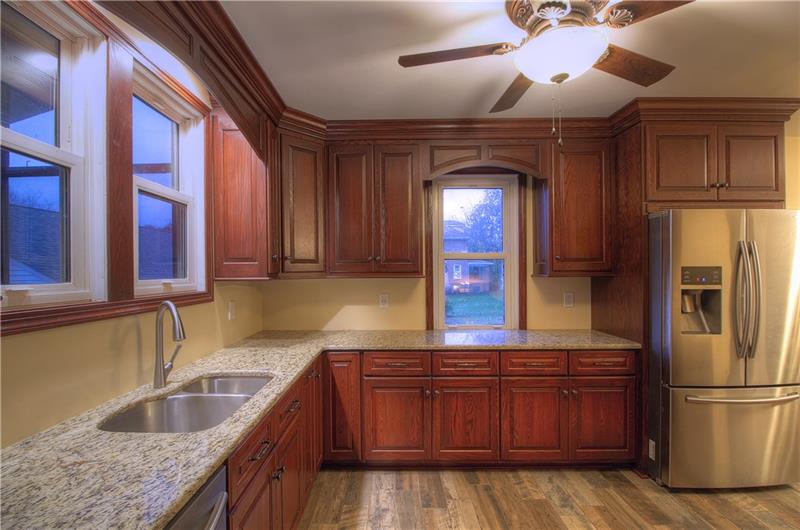 2248 Mercer Road New Brighton, PA 15066 - Photo 21 of 25 Definitely a kitchen even a seasoned chef would love! Stunning ceiling fan!