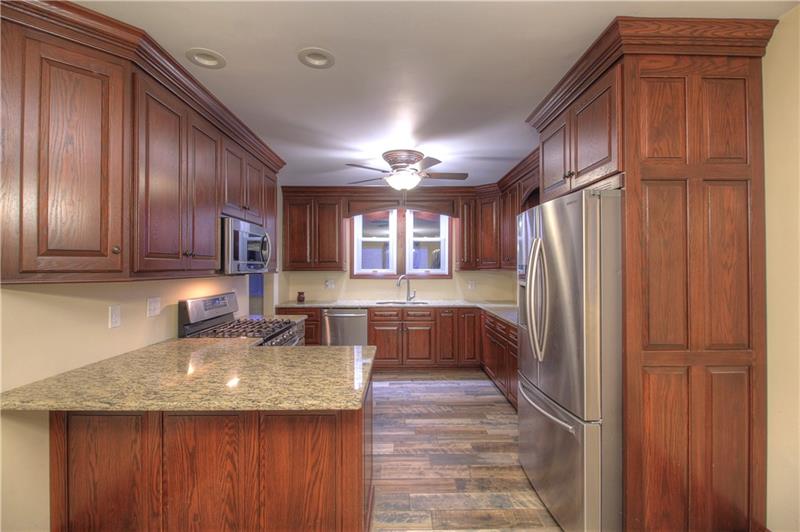 2248 Mercer Road New Brighton, PA 15066 - Photo 6 of 25 Superbly functional kitchen complete with moulding and side panels!