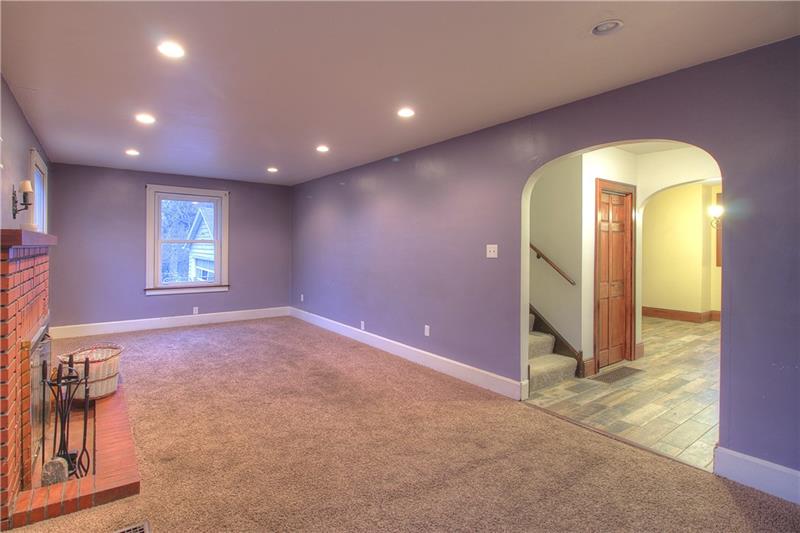 2248 Mercer Road New Brighton, PA 15066 - Photo 8 of 25 A view from the front left corner shows the additional canned lighting and new carpeting.